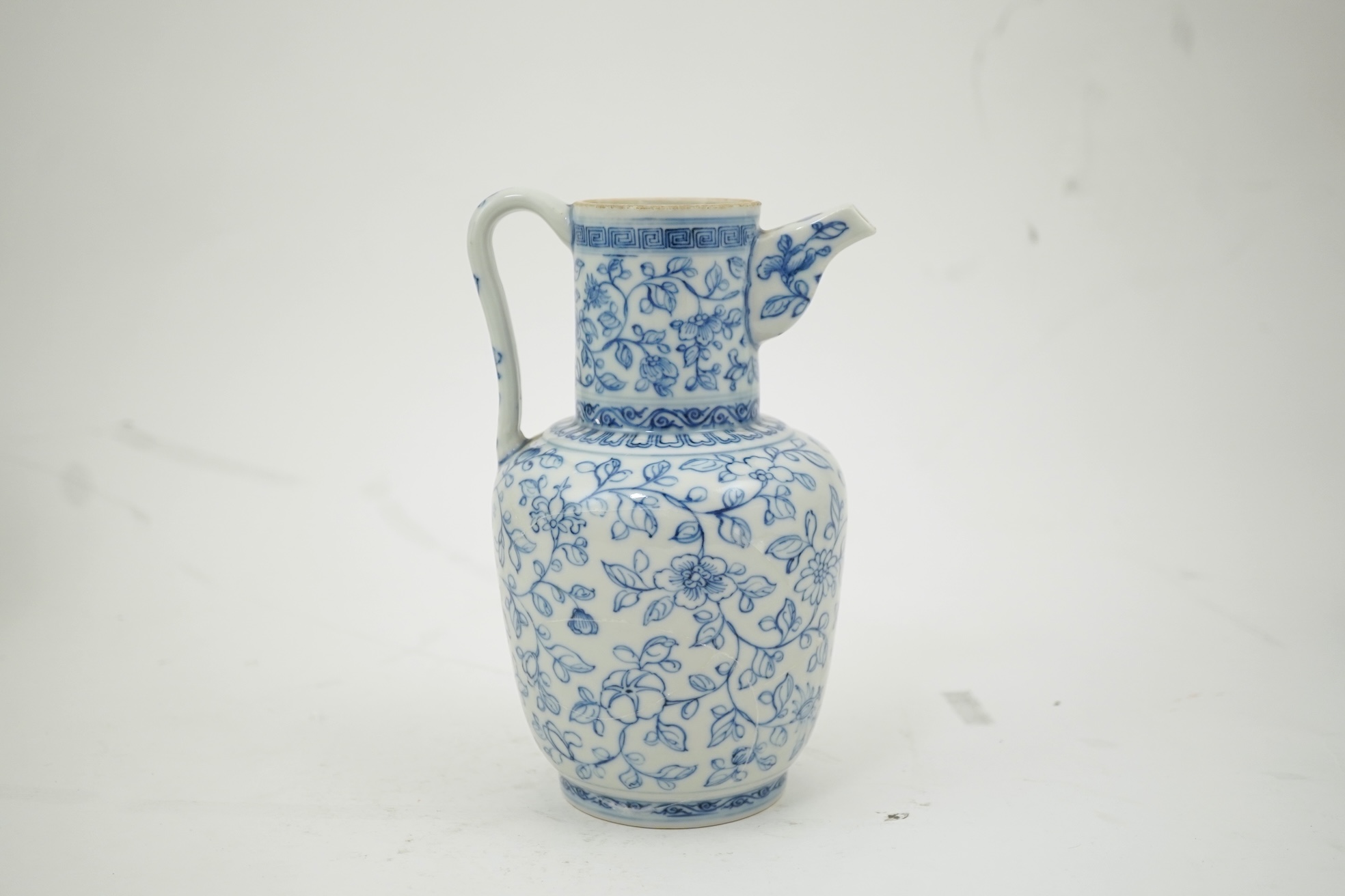 A Chinese blue and white ewer, Hongzhi mark, probably Qing dynasty